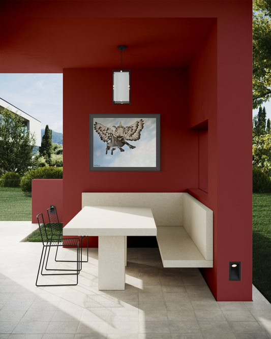 Modern outdoor seating area with a red wall, white table, and chairs with wall art of a flying bushpig or warthog.