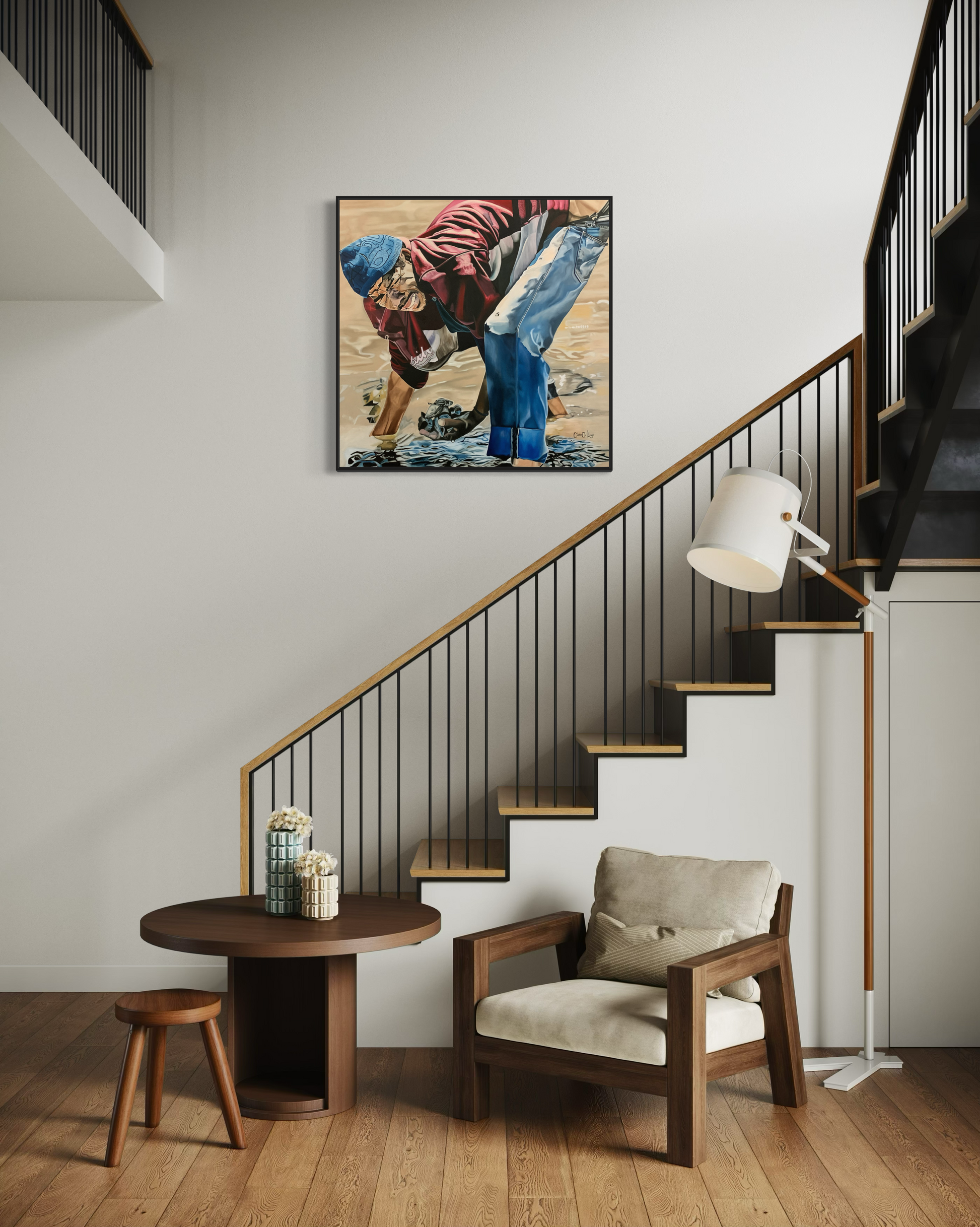 Modern interior with a staircase, chair, table, and artwork of a man harvesting oysters on the wall trying to make a living.